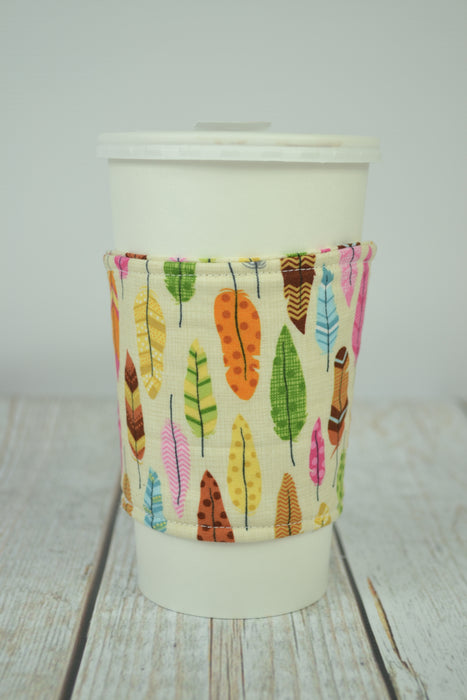 READY MADE Coffee Cozy - Colorful feathers - Christine Taylor Designs